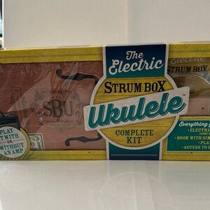 New in Box The Electric Strum Box Ukelele Complete Kit.
